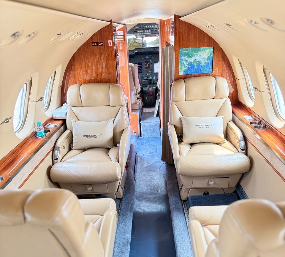 Hawker 900XP cabin aisle with leather club seats