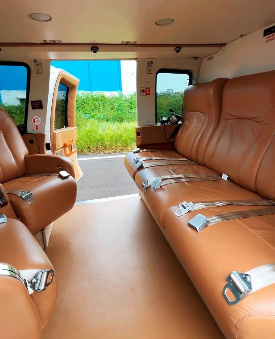 Three-place tan leather divan in the S-76C++